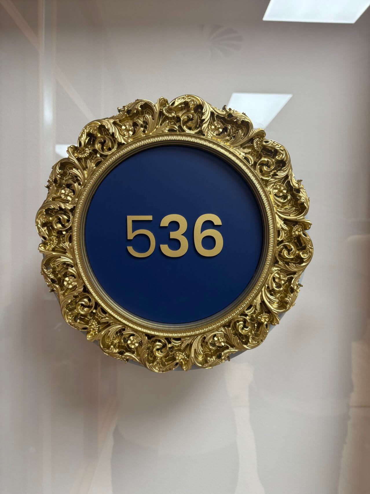 Blue sign on gold background